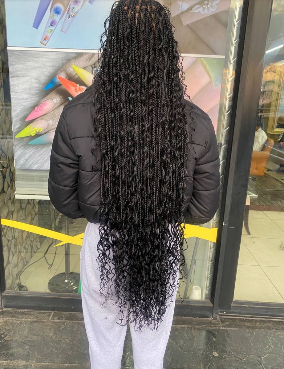 Very long black boho braids with curly ends